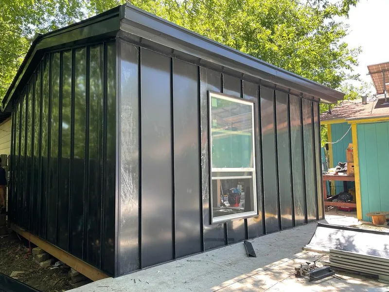 Black standing seam metal wall panels for Metal Roof Installation in Covedale