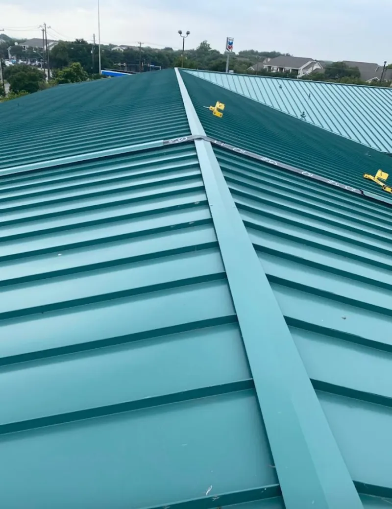 Green commercial metal roof ridge and valley for Metal Roof Repair in Covedale